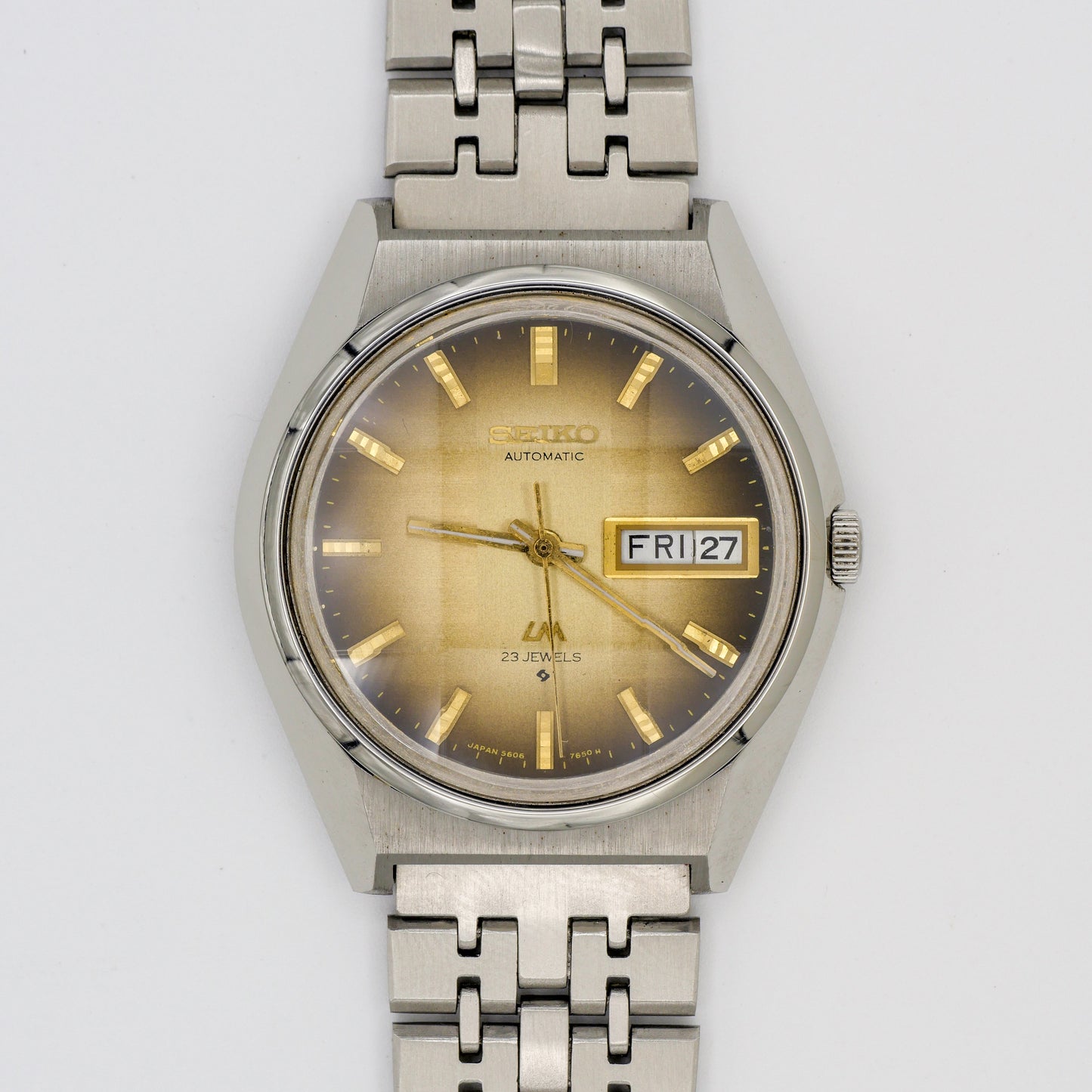 SEIKO LORD MATIC LM 23 JEWELS AUTOMATIC DAY-DATE FACETED CRYSTAL REF. 5606-7310