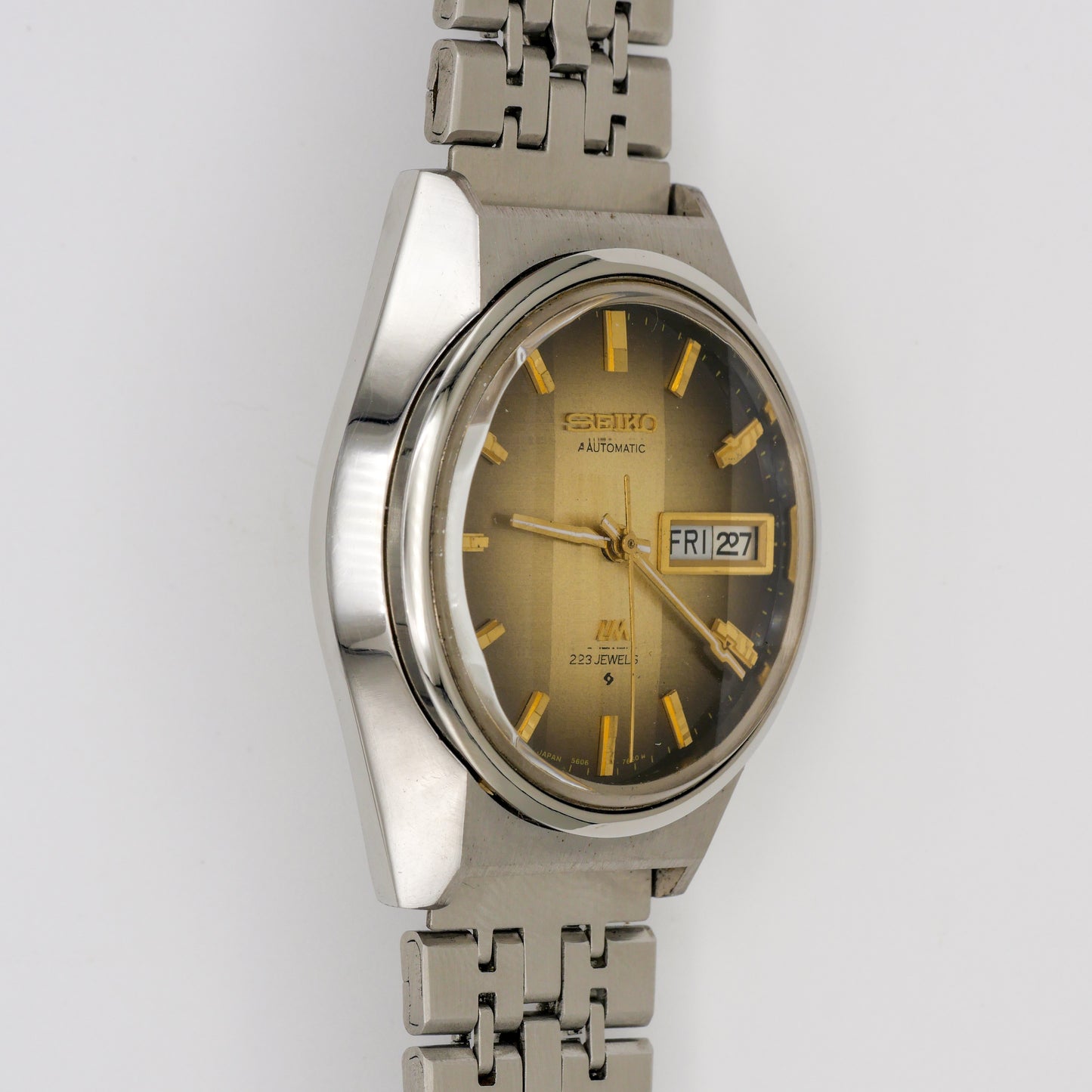 SEIKO LORD MATIC LM 23 JEWELS AUTOMATIC DAY-DATE FACETED CRYSTAL REF. 5606-7310