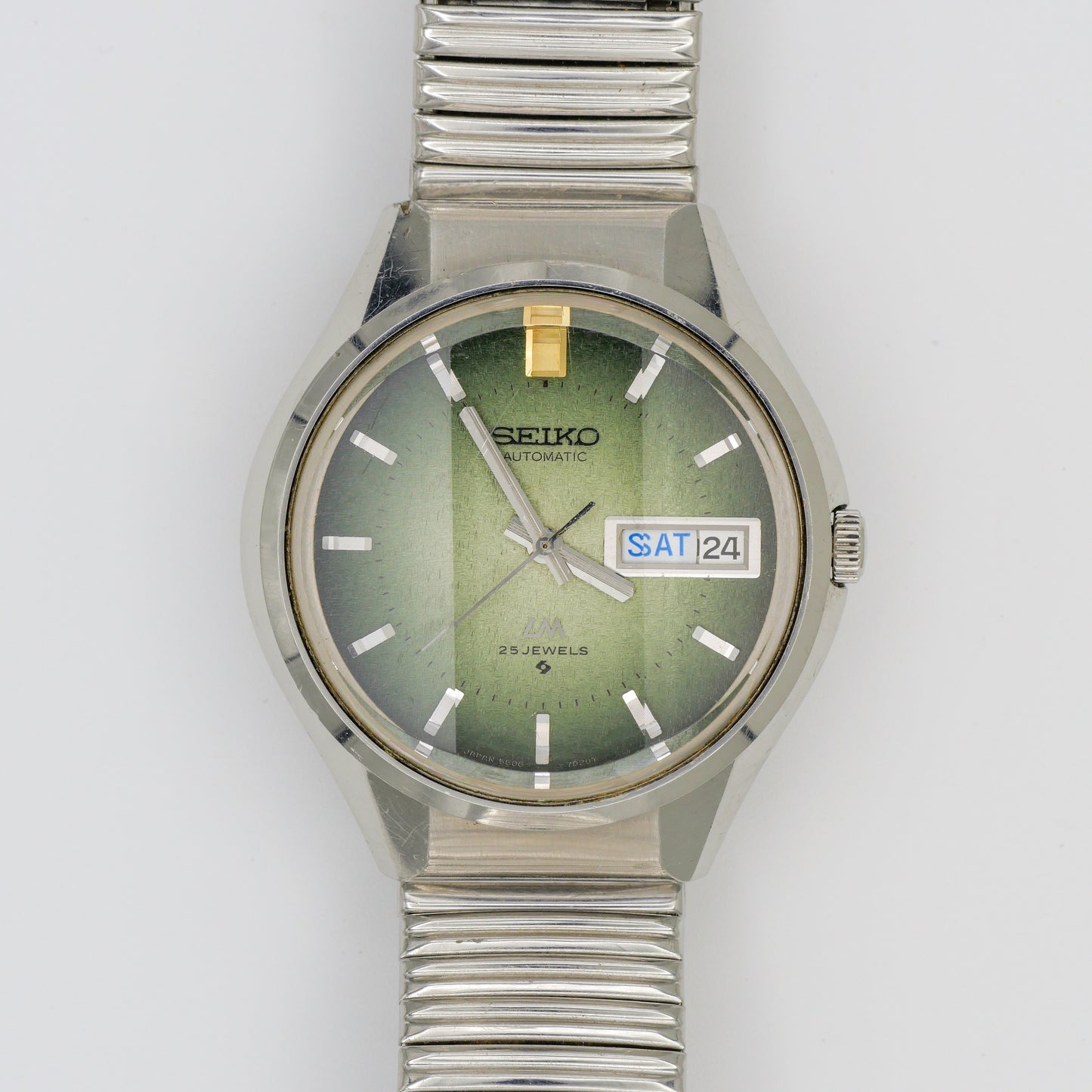 SEIKO LORD MATIC LM 23 JEWELS AUTOMATIC FACETED CRYSTAL GREEN DIAL REF. 5606-7290