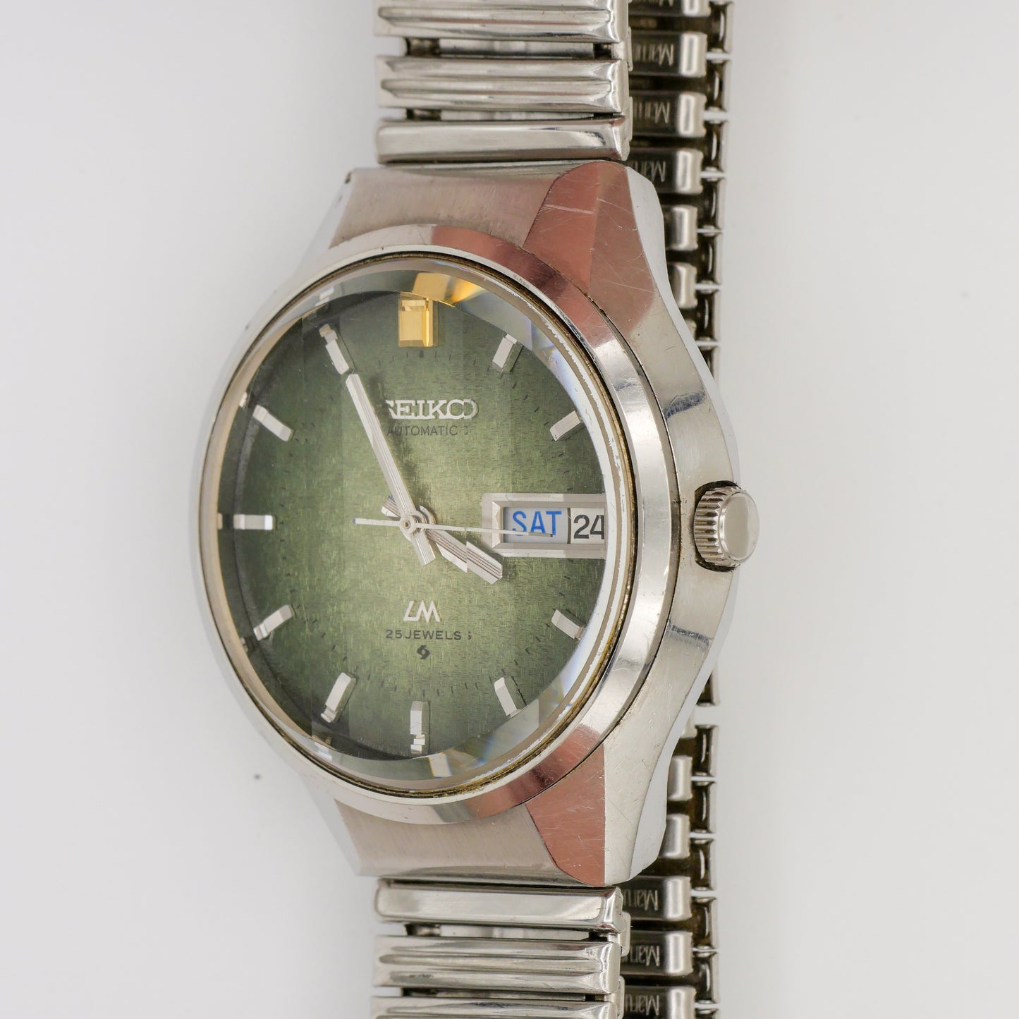 SEIKO LORD MATIC LM 23 JEWELS AUTOMATIC FACETED CRYSTAL GREEN DIAL REF. 5606-7290