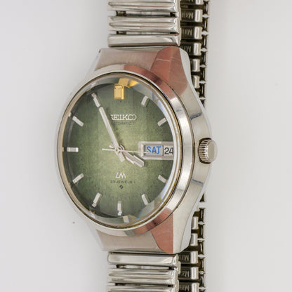 SEIKO LORD MATIC LM 23 JEWELS AUTOMATIC FACETED CRYSTAL GREEN DIAL REF. 5606-7290