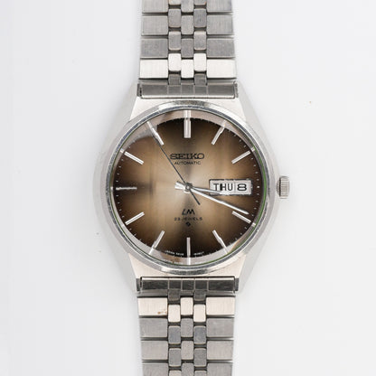 SEIKO LORD MATIC LM DAY-DATE AUTOMATIC FACETED CRYSTAL BROWN DIAL REF. 5606-8130