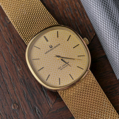 UNIVERSAL GENÈVE MICROTOR GILT SHADOW AUTOMATIC 10 MICRONS GOLD PLATING REF. 566051