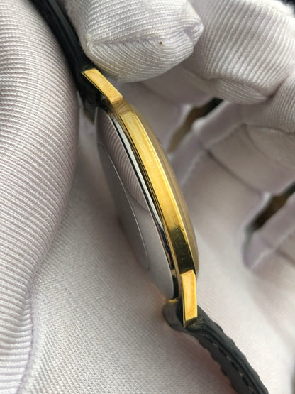 OMEGA GENÈVE BLACK GILTY DIAL REF. 111.0114