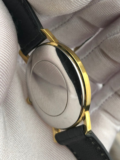 OMEGA GENÈVE BLACK GILTY DIAL REF. 111.0114