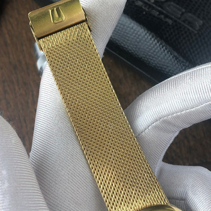 UNIVERSAL GENÈVE MICROTOR GILT SHADOW AUTOMATIC 10 MICRONS GOLD PLATING REF. 566051